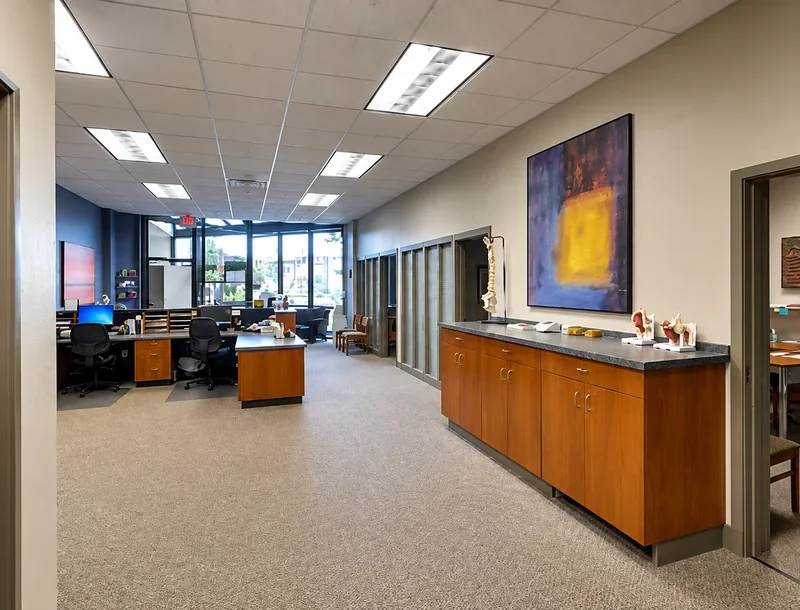 Front office and hallway with anatomy models on the counter