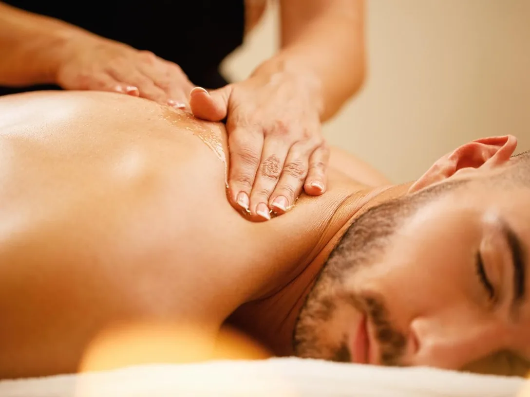 Man receiving a shoulder massage